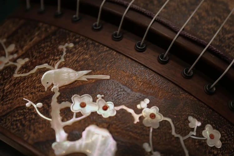 Raden (mother-of-pearl inlay) decoration applied to a koto