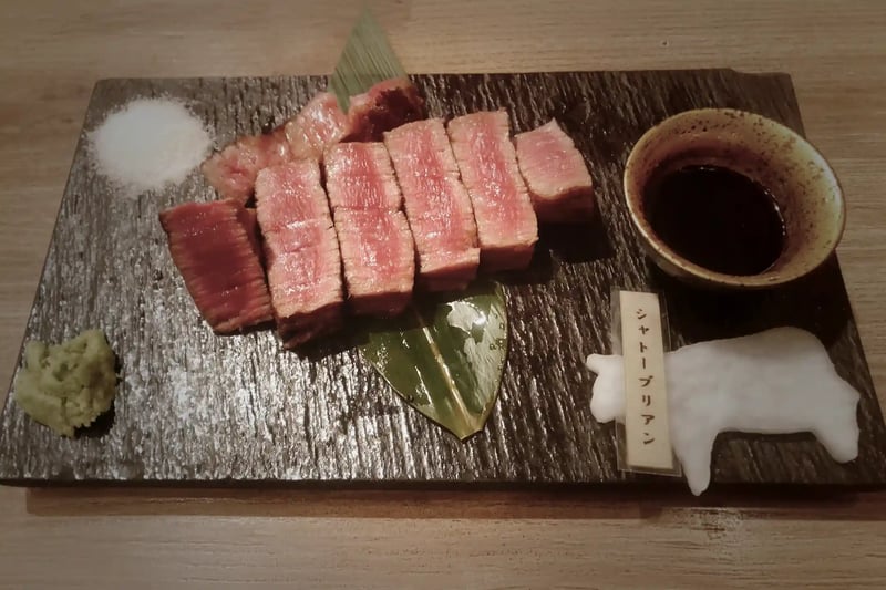 A wagyu steak cut to show the marbling