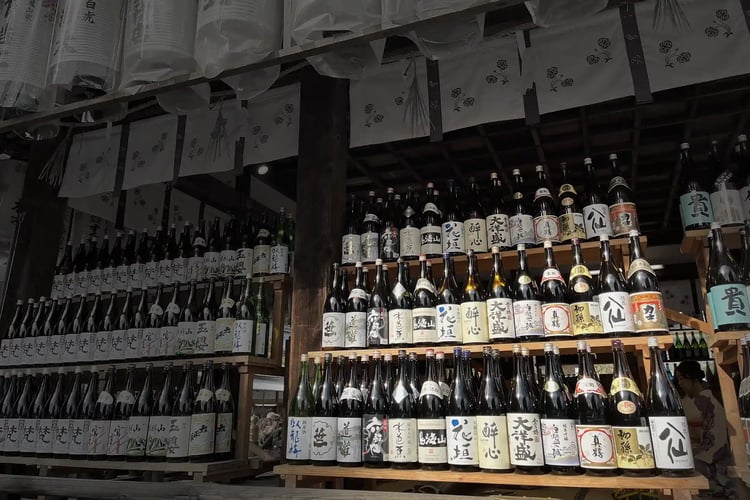 Bottles of sake lined up at a brewery in Nikko City