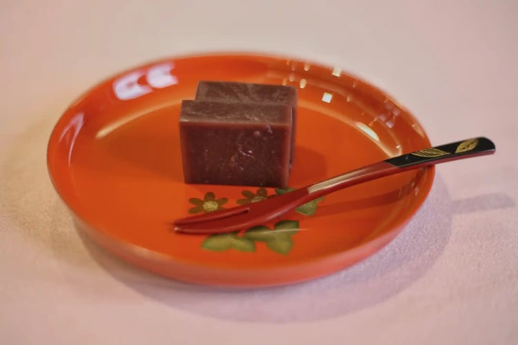 A Wajima lacquer plate with Wagashi