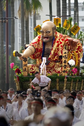 A Hakata Gion Yamakasa float being carried through the streets