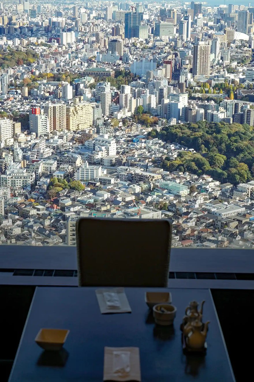 A restaurant seat and a city view