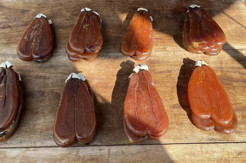Karasumi, salted and dried mullet roe, sliced thin