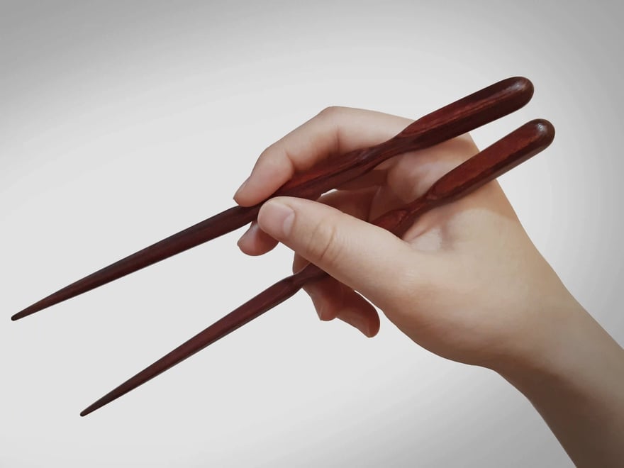 how to hold chopsticks
