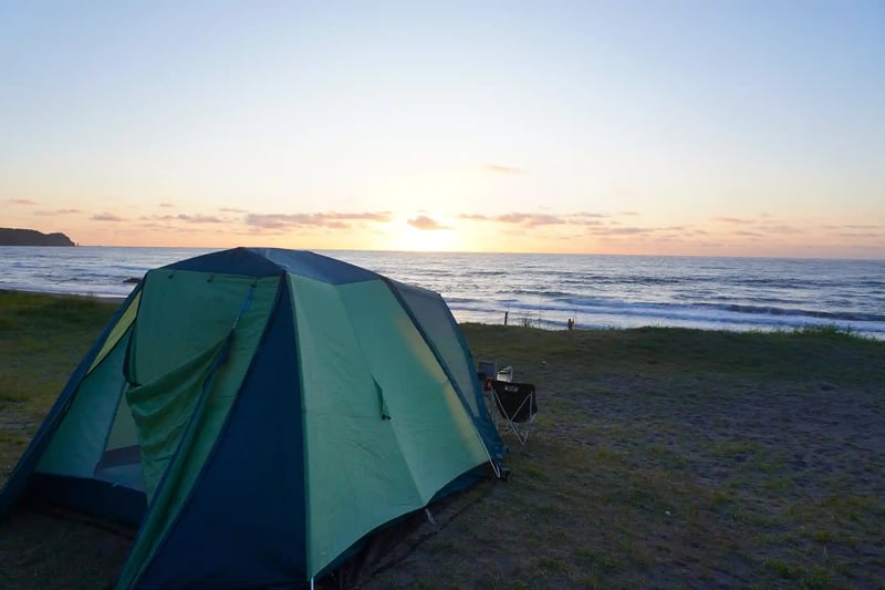 Pitching a tent at a seaside campsite in Hokkaido