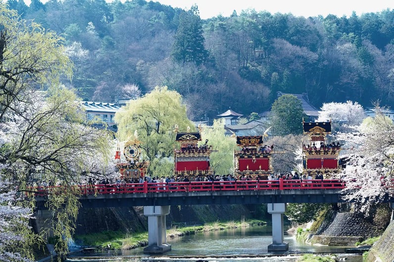 Floats of the Takayama Festival and the Red Bridge