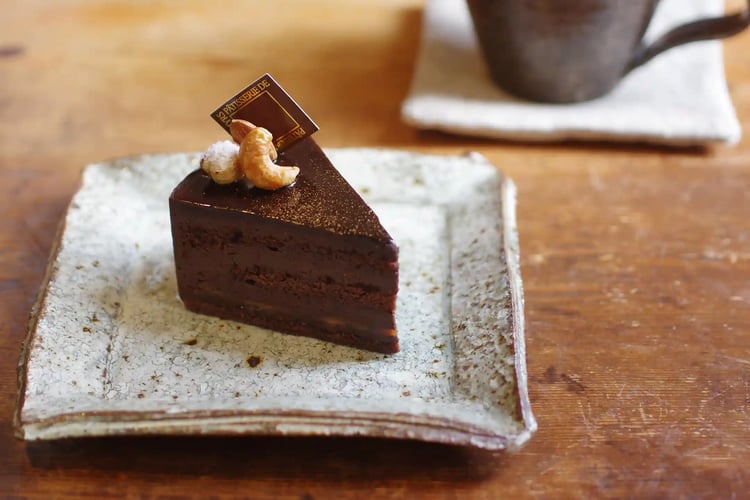 Japanese tableware and chocolate cake, close-up, horizontal orientation