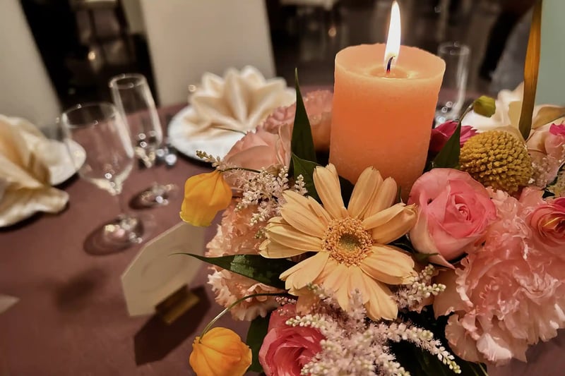 Vibrant flowers and candles