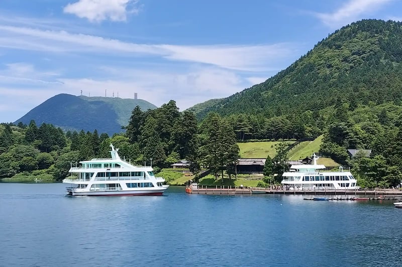 The Hakone Sightseeing Cruise arriving at Hakonemachi Port, as seen from the Lake Ashi pirate ship