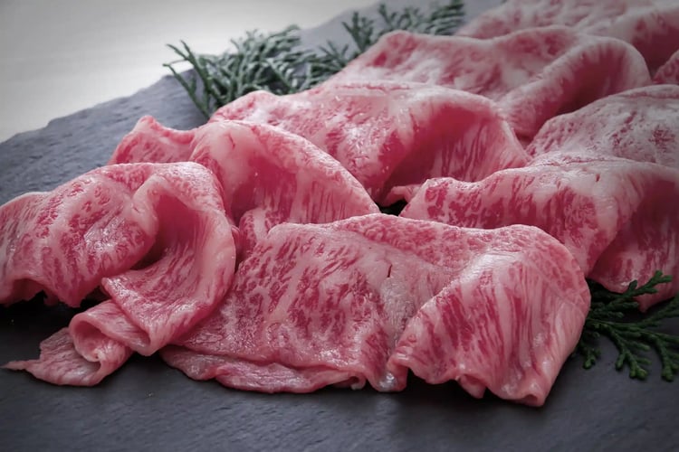 Thin-sliced well-marbled Kuroge Wagyu beef