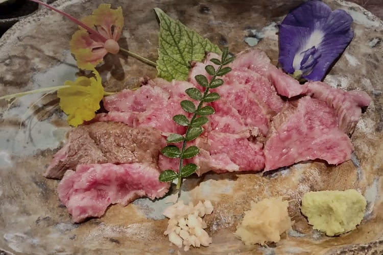 Seared Wagyu Slices (Tataki Style) and Traditional Japanese Pottery