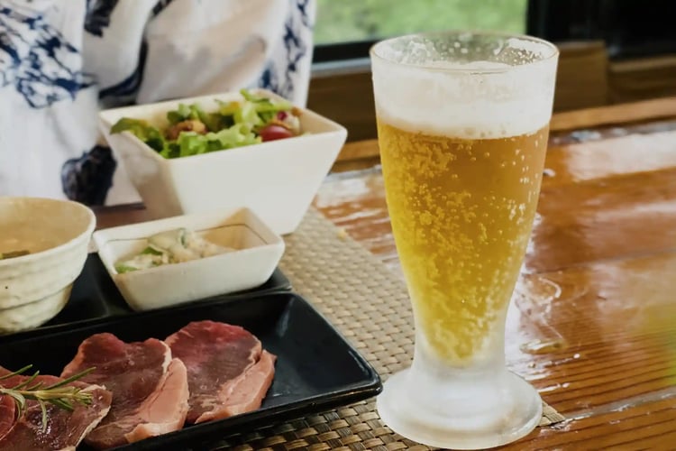 Dinner and draft beer at a Ryokan