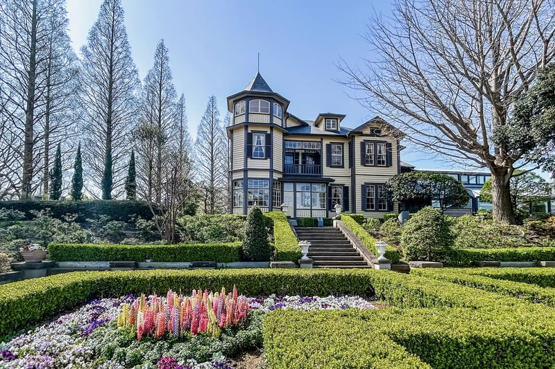 The Home of a Diplomat in Yamate, surrounded by beautiful flowers and lush greenery