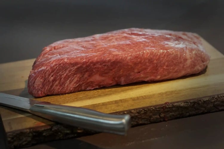 Block of marbled Kobe Wagyu beef