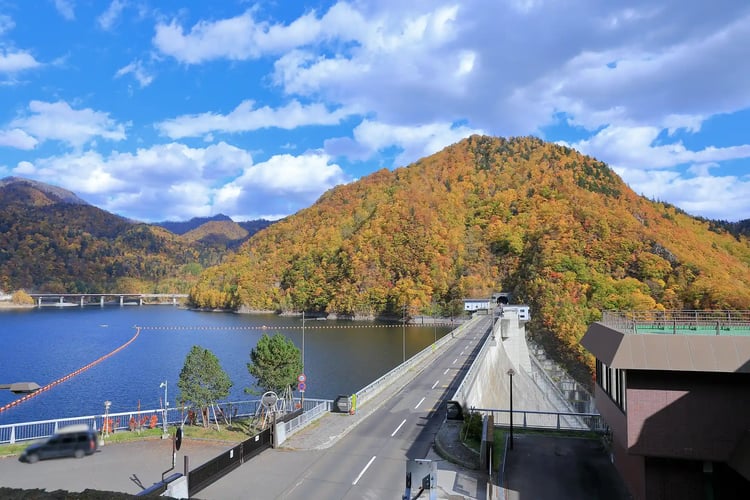 View of Jozankei Dam, the reservoir, and the dam crest road from the observation deck