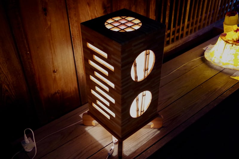 The glow of a wooden lantern, infused with the essence of Japanese aesthetics