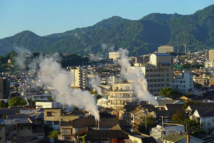 The morning sunlight shining over the hot spring town of Beppu