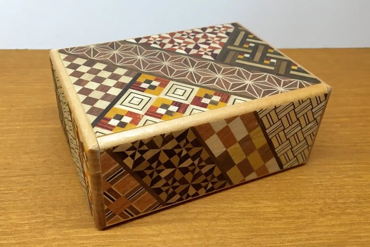 A Craftsman Opening a Yosegi-zaiku Puzzle Box by Hand