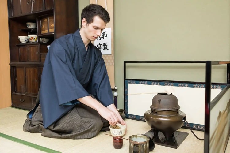 The Act of Preparing and Whisking Matcha Green Tea in the Way of Tea