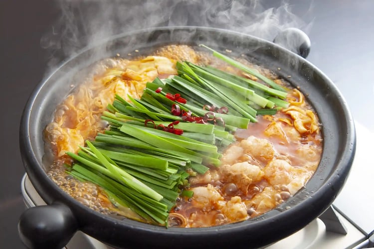 Traditional Japanese Motsunabe and Spicy Kimchi Motsunabe Hot Pot Dishes