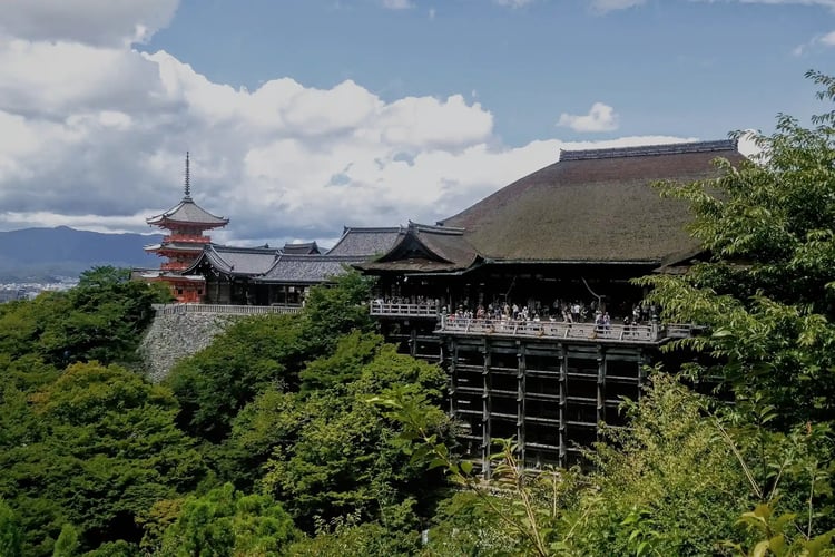 Kiyomizu-dera Temple with white clouds floating in the blue sky