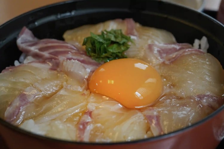 Ehime_s Tai-meshi (Hyuga-meshi) topped with an egg yolk