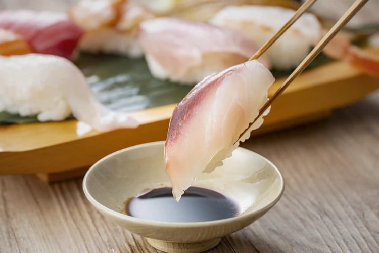 Sushi, soy sauce, and chopsticks