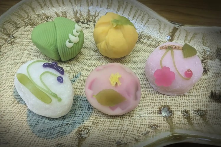Japanese confectionery presented in elegant bowlsdishes