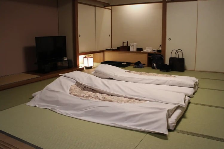 A bedroom with tatami mats at a ryokan