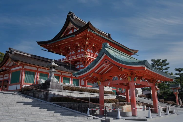 Thin Clouds and Fushimi Inari-taisha Shrine_s Romon Gate and Temizuya