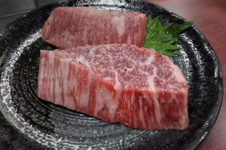 Large chunk of raw Kuroge Wagyu beef