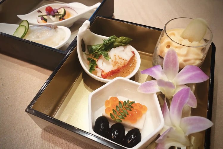 Appetizers in a Tiered Lacquer Box