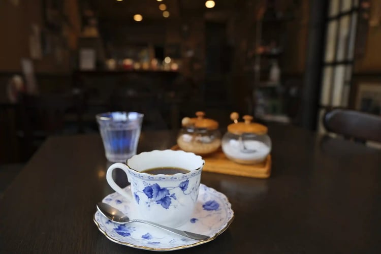 Dark roast coffee at a nostalgic retro cafe