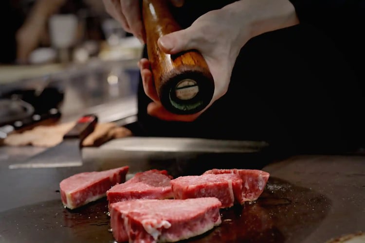 Season the steak with salt and pepper