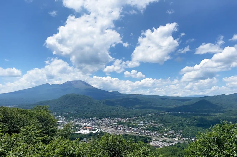 A panoramic view of Karuizawa Station and Mount Asama