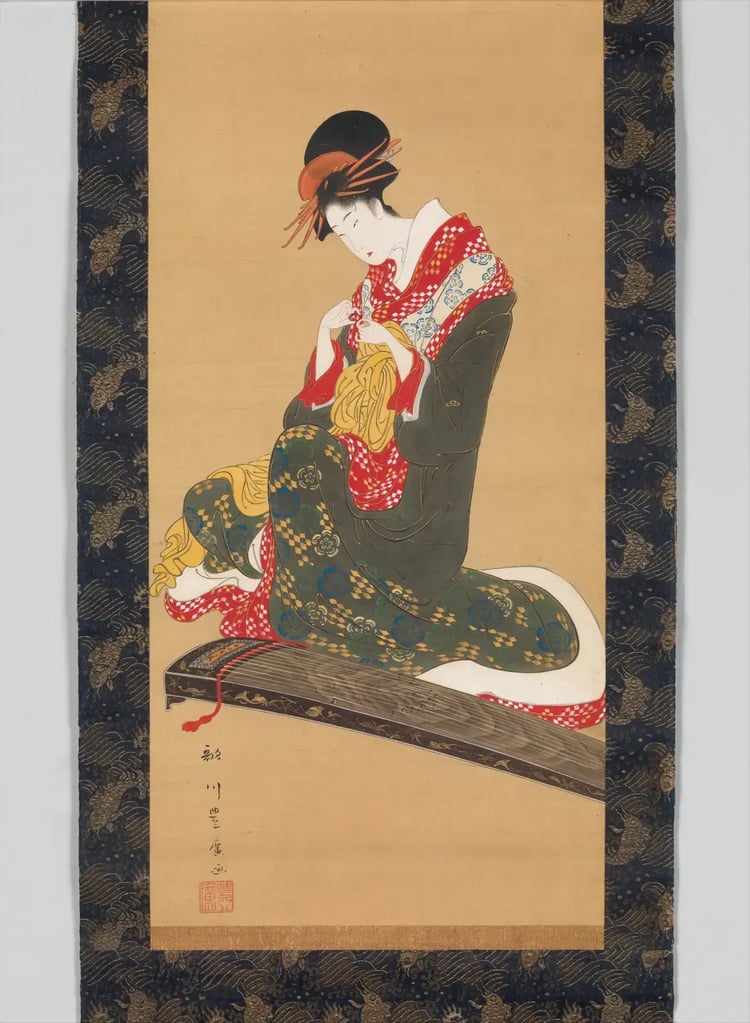 Ukiyo-e print by Utagawa Toyohiro showing a woman fitting tsume plectrums onto the first three fingers of her right hand before playing the koto