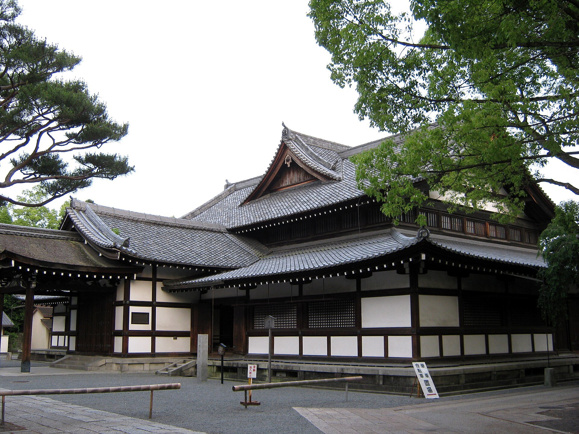The Butokuden, the Hall of Martial Virtue in Kyoto, seen from outside with its tiled roofs and white plaster walls
