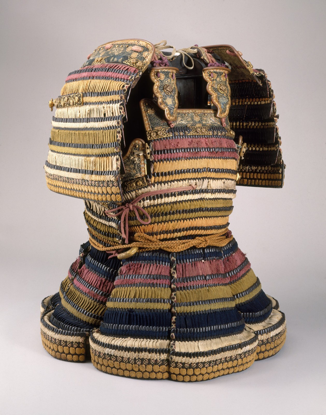 A suit of Japanese dō-maru armour, dated to around 1550, with an 18th-century helmet
