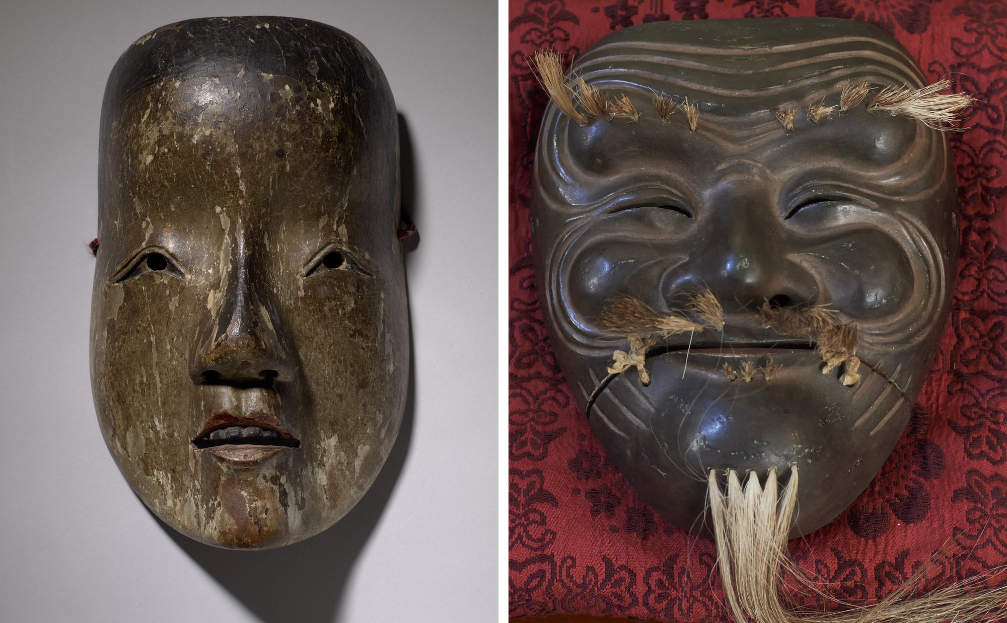 A noh mask on the left and a kyogen mask on the right, placed side by side: the noh mask is smooth and quiet, the kyogen mask has furrowed brows and tufts of hair