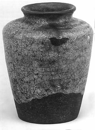 A tea jar that the Metropolitan Museum of Art catalogues as clay covered with a raku glaze, crackled and blotched