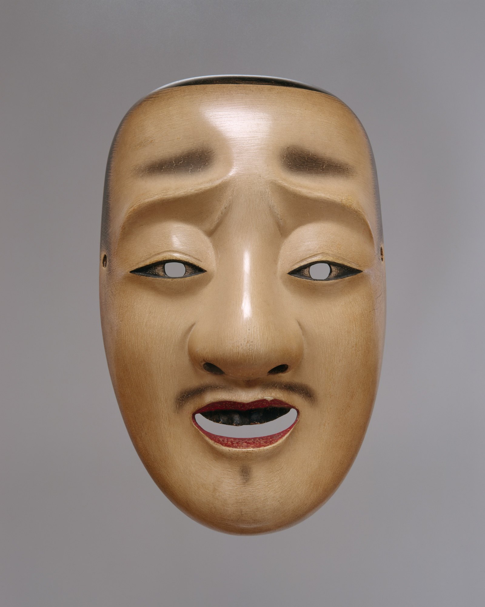 A Chujo noh mask, the face of a courtly young man used for warrior roles