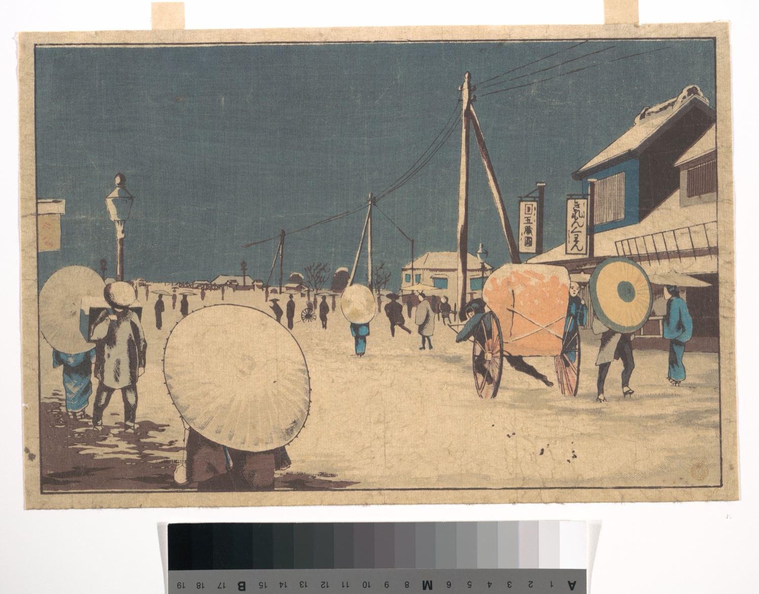 A Meiji-era print of an Edo street at dusk, street lamps and telegraph poles standing over the snow